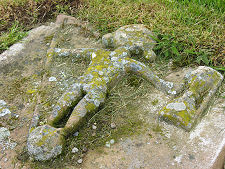 Figure on Old Gravestone